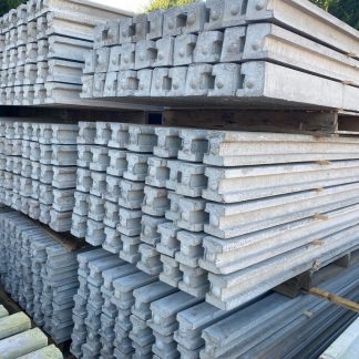 Stacks of concrete fence posts