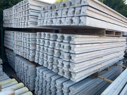 Stacks of concrete fence posts
